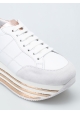 Zapatillas de deporte de tacón bajo cuñas de Hogan en piel blanca