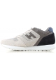 Zapatillas de deporte para hombre Hogan en piel gris y blanco roto.