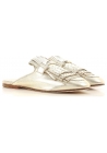 Zapatillas sandalias con plano cerrado de Tod's en piel dorada metalizada.