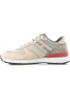 Zapatillas bajas de Hogan para hombre en piel beige.